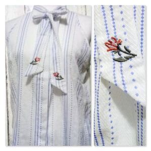 Alice Blue Sleeveless Tie Neck Button Down Blouse